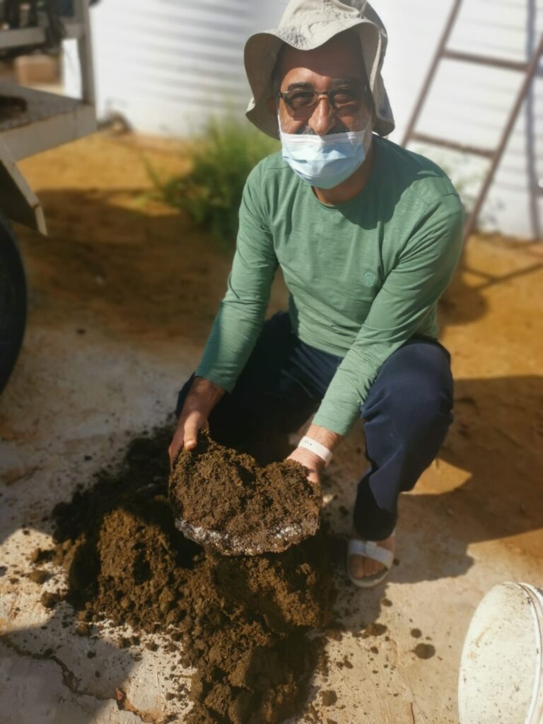 Author with the camel manure compost